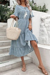 Robe imprimée à volants et pompons